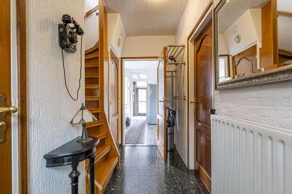 Vrijstaande woning met garage en tuinkamer te koop in Simpelveld